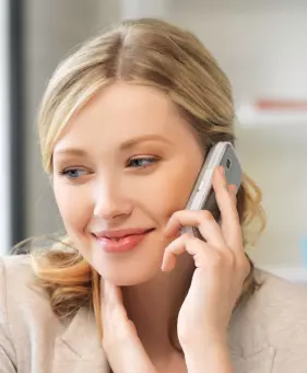 a girl is talking on the phone